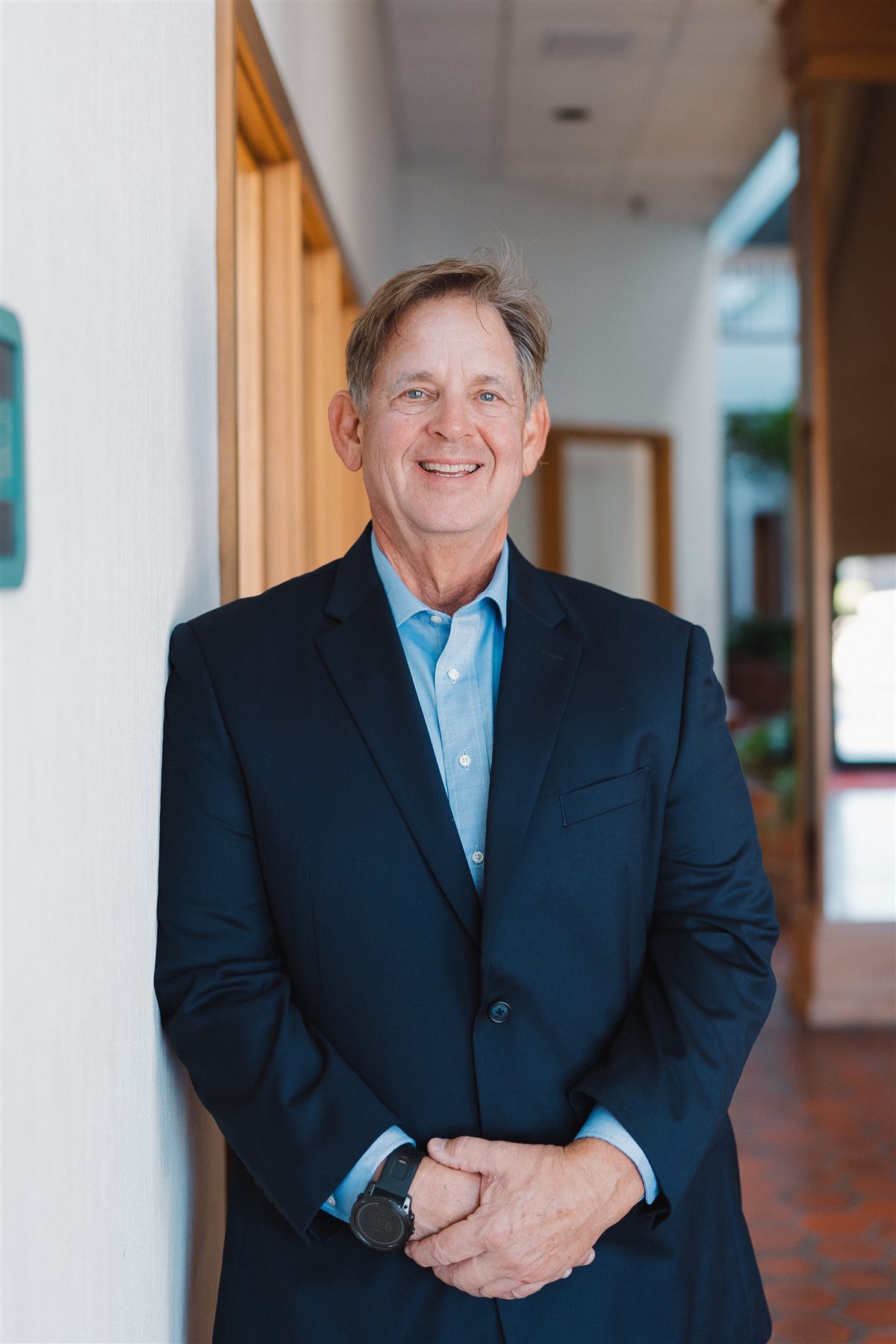 Robert Melsom standing next to a wall
